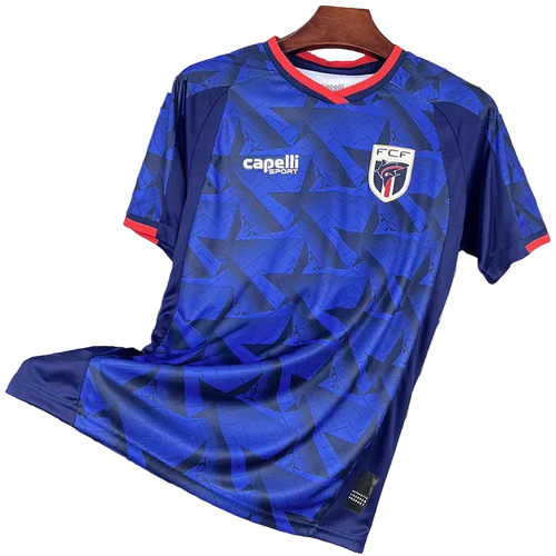 Blue sports jersey with visible branding on a hanger against a wire mesh background